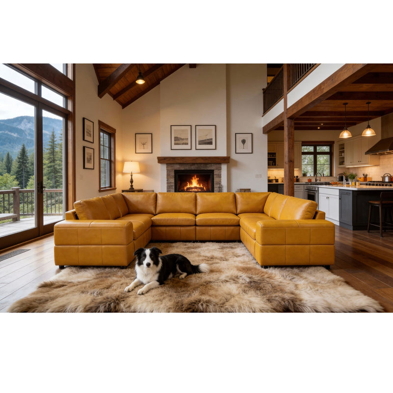 Honey tan sectional sofa with large square arms and tufted back cushions.