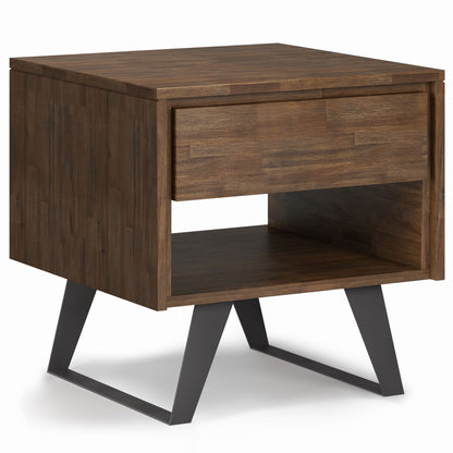 Warm brown wood end table with open shelf and drawer front, black metal base