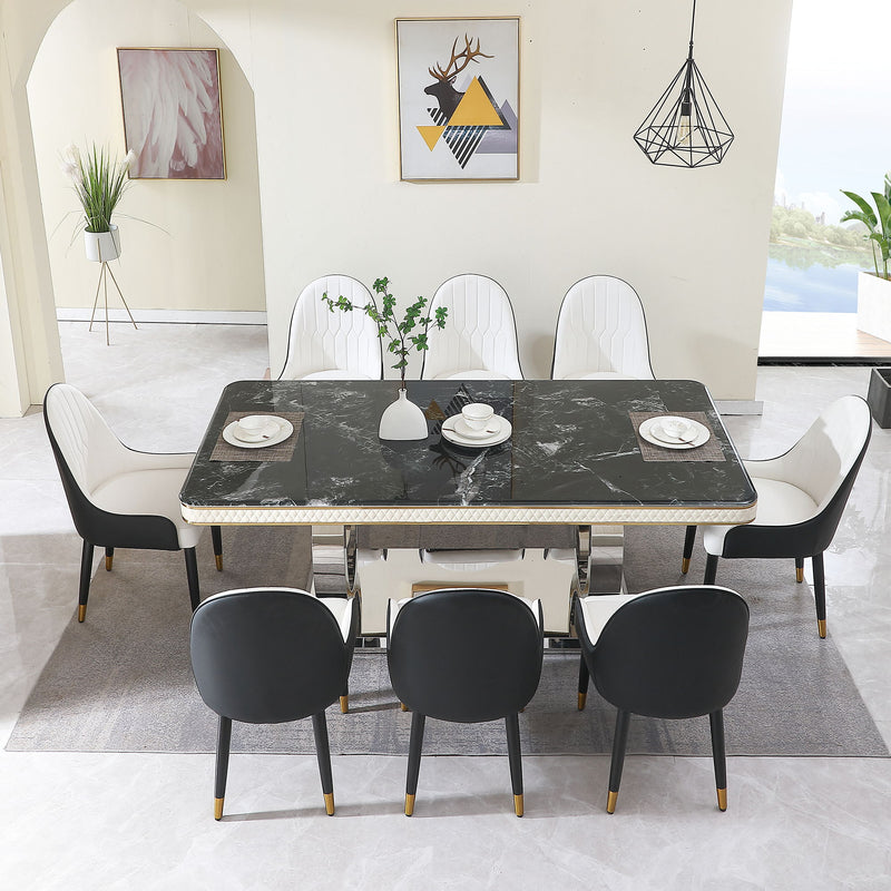 Black marble-look dining set: table with gold trim and 6 white chairs around it