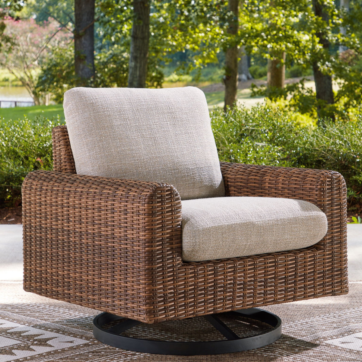 Dolan Creek - Swivel Lounge With Cushion - Gray / Brown