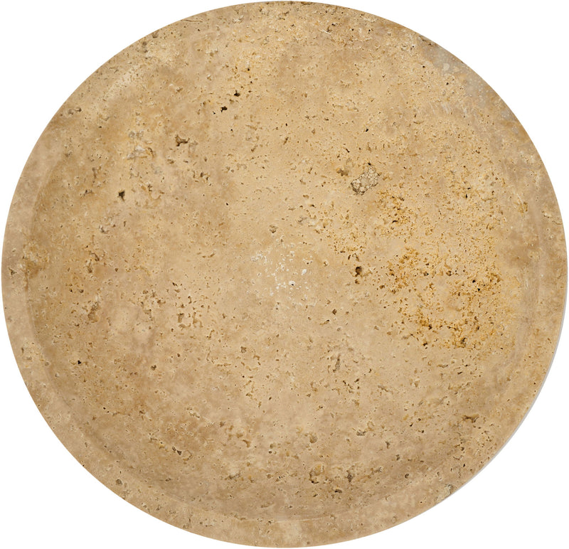 Beige travertine round bowl surface close-up with natural speckles