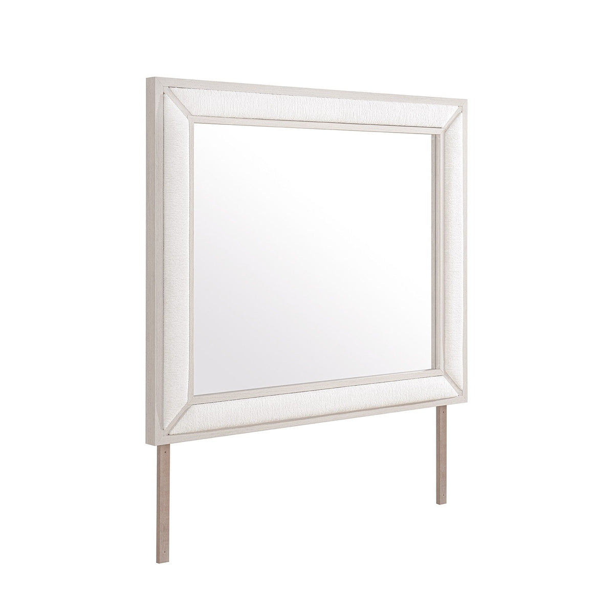 Beige rectangular framed mirror with textured edge trim and slim tapered legs