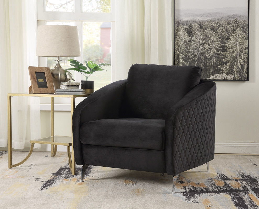 Black modern accent armchair with quilted arm side, padded seat, and short metal legs