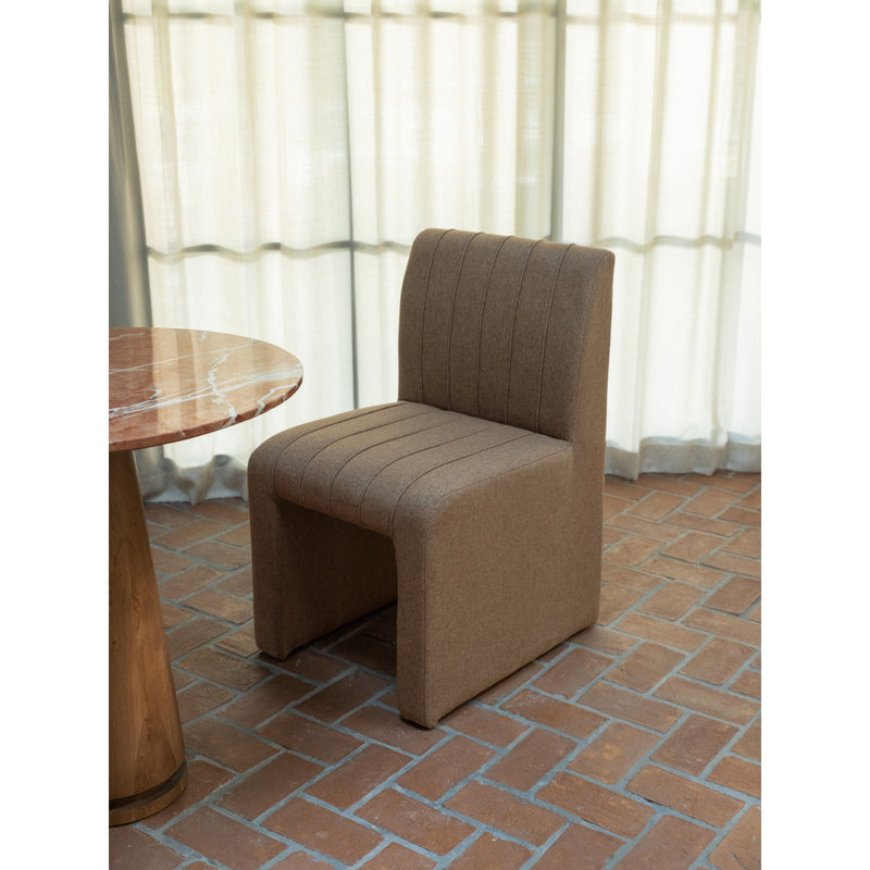 Light brown dining chair with tall channel back and padded armrests, square base