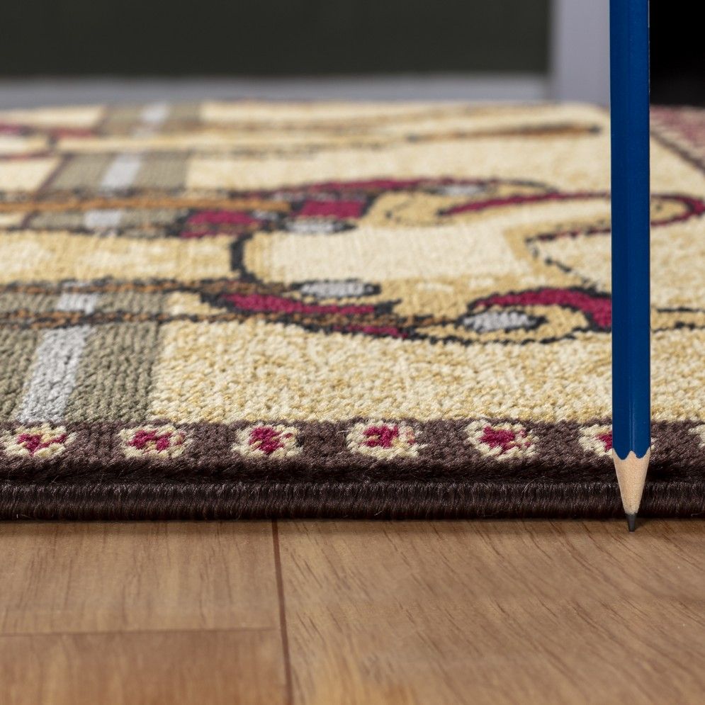 Southwest area rug corner close-up with beige pile, multicolor geometric trim