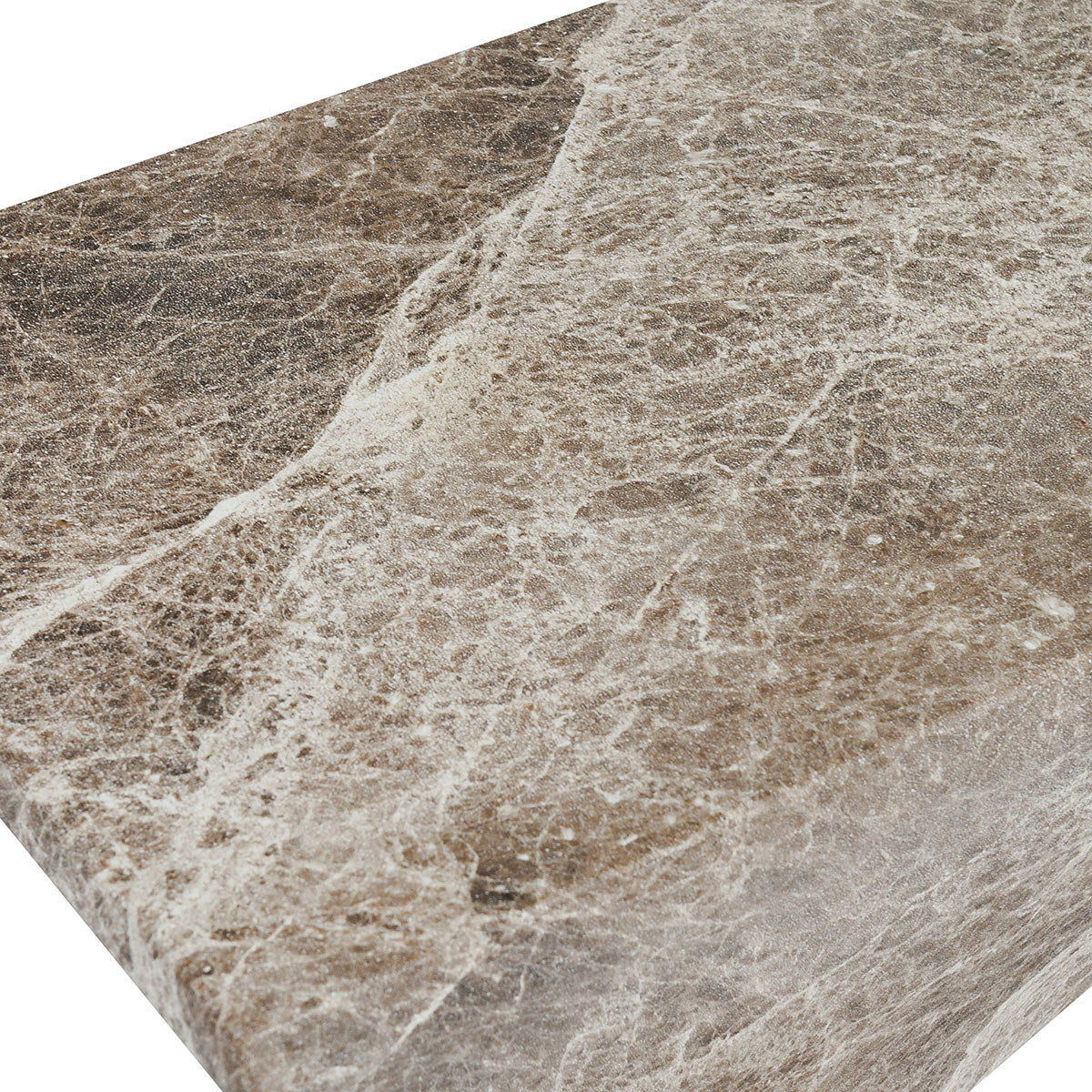 Concrete accent table surface close-up, speckled brown and ivory textured finish