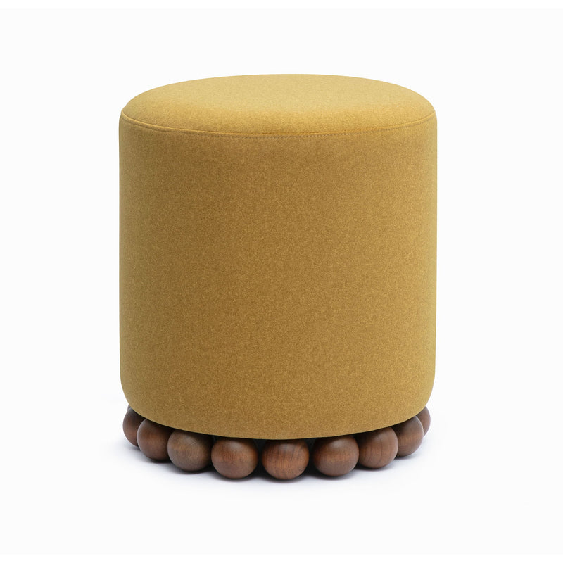 Round upholstered ottoman in light brown with beaded wooden base, front view