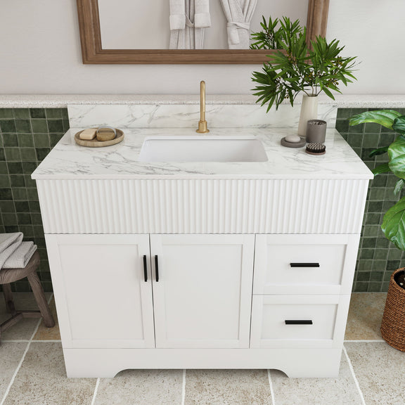 White bathroom vanity with fluted cabinet, square sink, gold faucet, center double doors