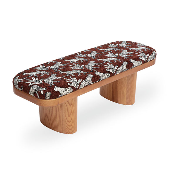 Leopard jacquard bench with dark brown top and white animal print, curved light wood legs