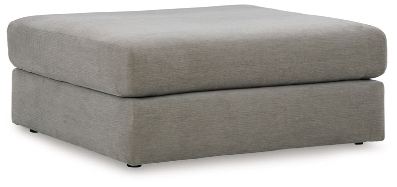Ash gray upholstered oversized accent ottoman with low square profile and short legs