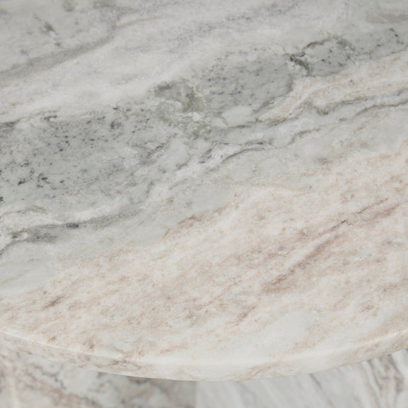 Close-up of gray marble round tabletop with natural veining pattern