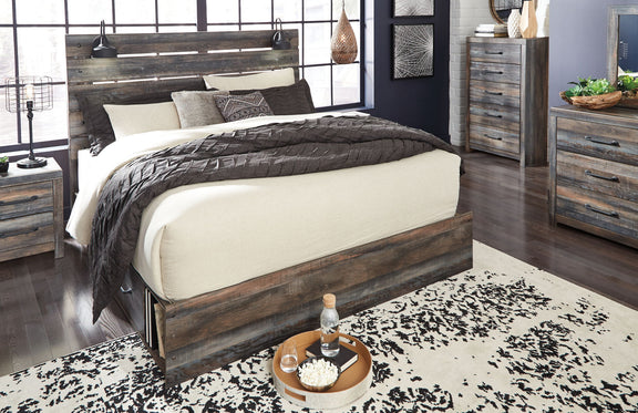 Panel bed with dark wood frame, slat headboard, and a beige upholstered panel