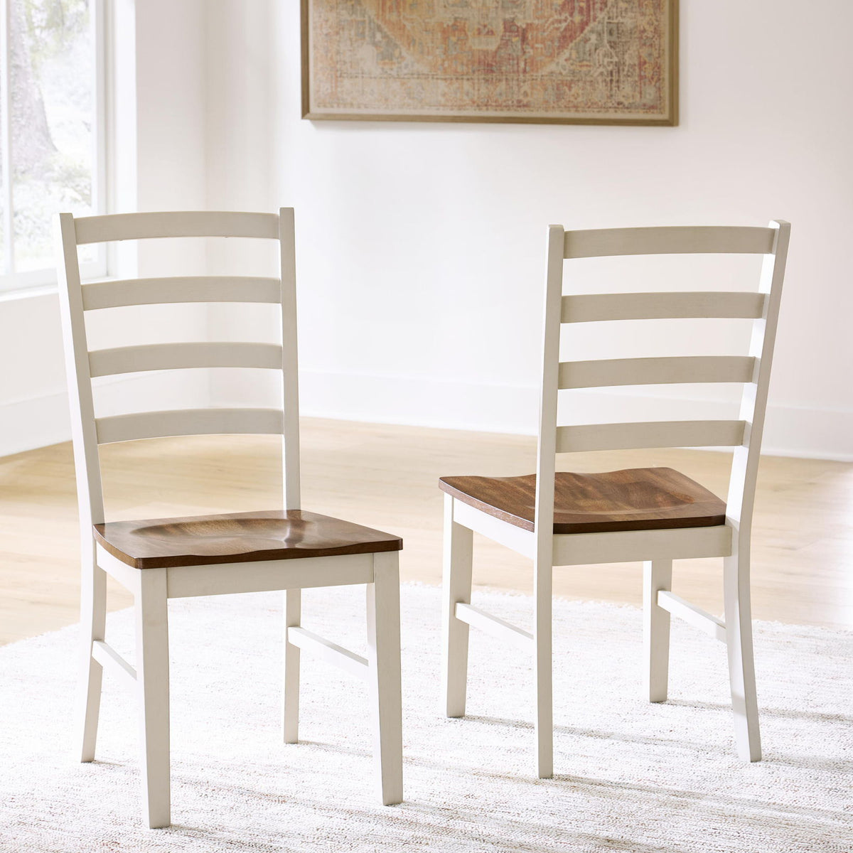 Dining side chairs with antique white frames and brown wood seats, slatted back