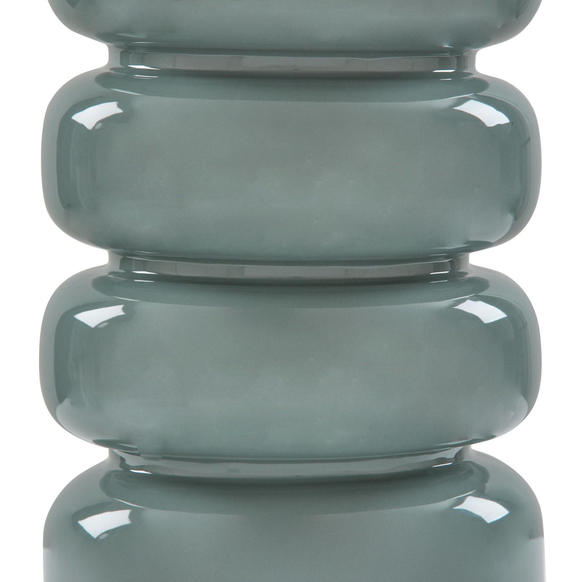 Ceramic table lamp base close-up in gray-blue with stacked rounded forms
