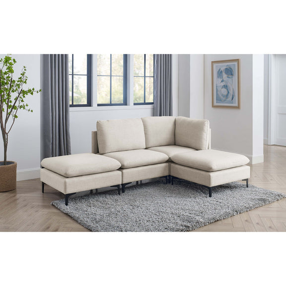 Beige modular sectional sofa with tall legs, corner chaise and ottoman seats