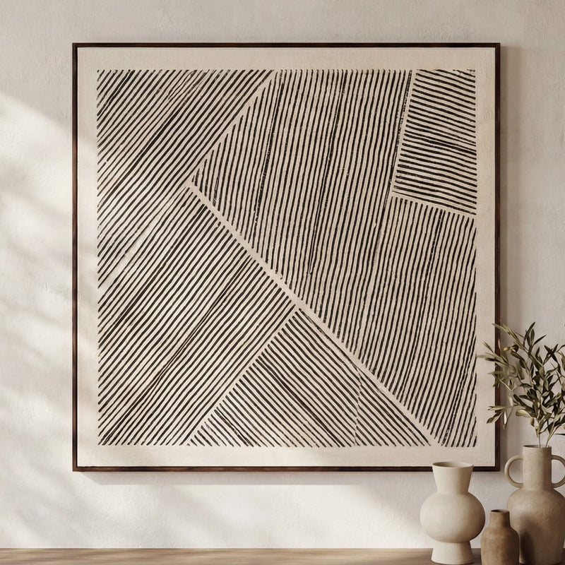Framed abstract striped painting with diagonal and crosshatch lines in black and gray