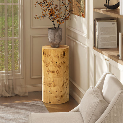Round-top pillar accent side table with light-brown wood grain and speckled finish
