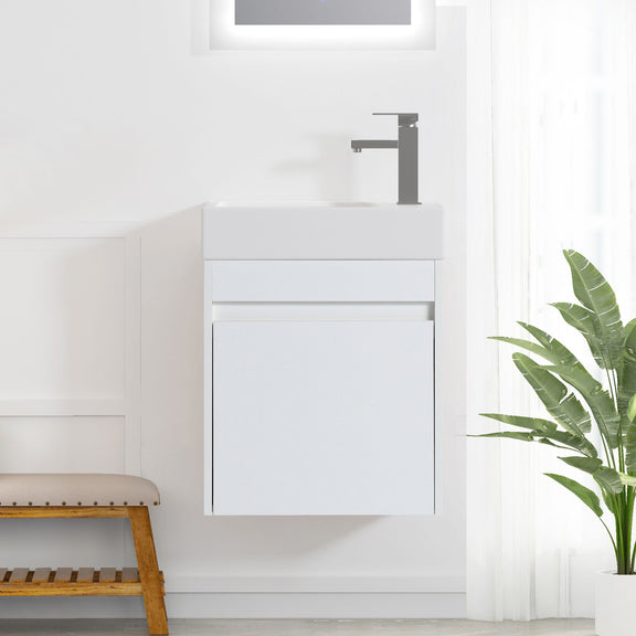 White floating bathroom vanity with soft-close cabinet door and built-in sink