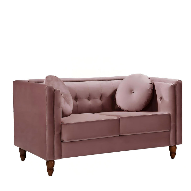 Blush pink 2-seater velvet loveseat with tufted back and round accent pillows