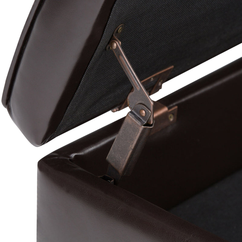 Brown storage ottoman lid with metal hinge and open interior base