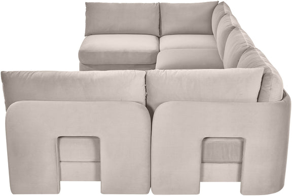 Gray velvet armless sectional sofa close-up with button-free padded panels