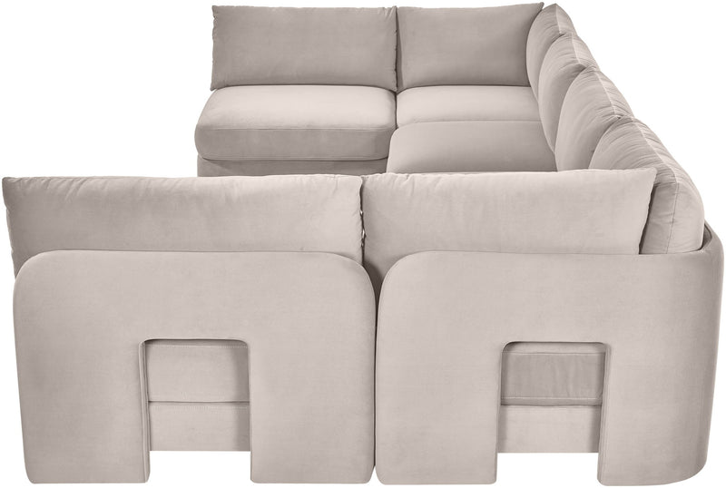 Gray velvet armless sectional sofa close-up with button-free padded panels