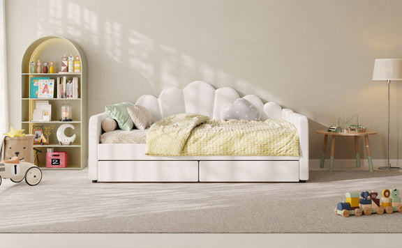 White upholstered daybed frame with scalloped shell headboard and slatted mattress base