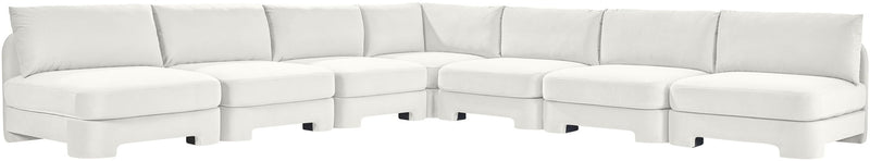 White velvet performance sectional sofa with armless seating and channel-tufted back