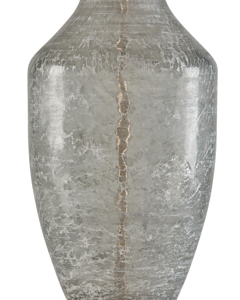Textured clear-gray glass lamp base with vertical seam detail and brassy base ring