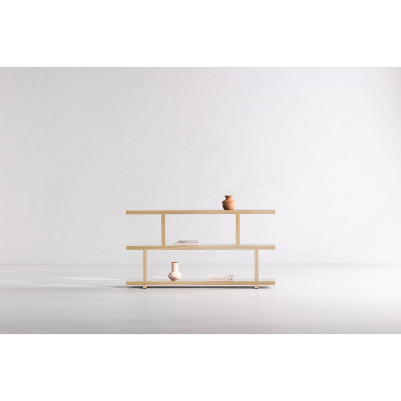 Small open shelf unit in white-wash oak, three-tier design with lower platform base