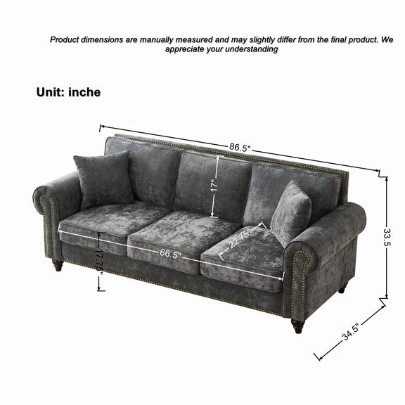 Dark gray tufted 3-seater sofa with rolled arms and studded trim