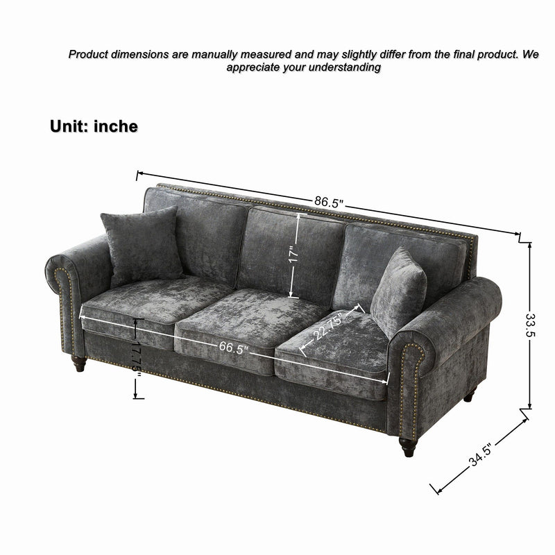 Dark gray tufted 3-seater sofa with rolled arms and studded trim