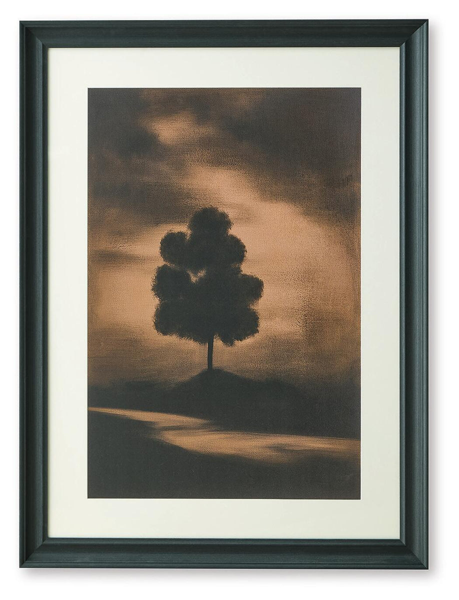 Framed wall art print with dark tree silhouette in a brown sky landscape