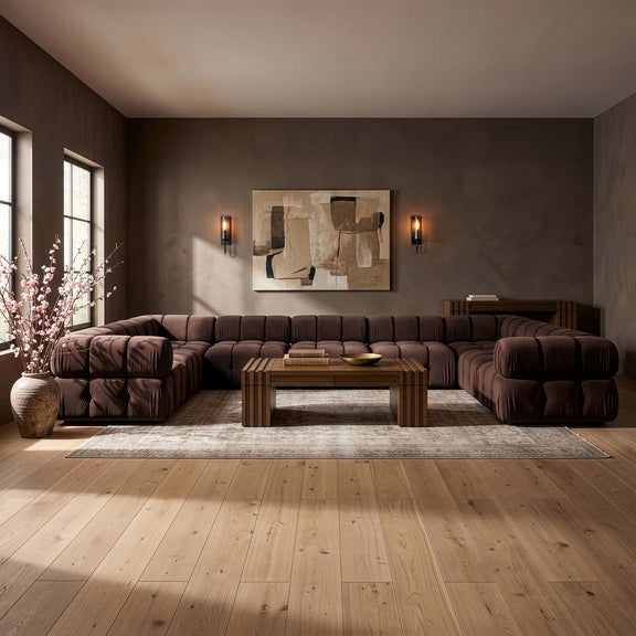 Dark red velvet sectional with tufted cushions and modular chaise and corner pieces