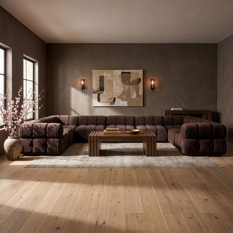 Dark red velvet sectional with tufted cushions and modular chaise and corner pieces