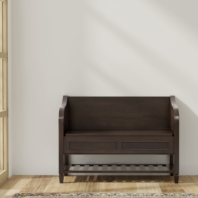 Dark chestnut wood entryway storage bench with open shelf, two drawers, slatted base