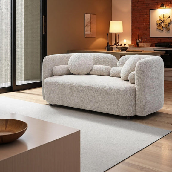 Light beige 2-seat upholstered sofa with large seat cushion and two bolster pillows