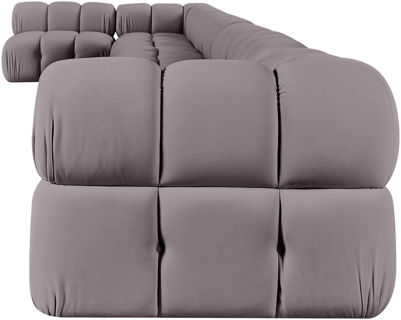 Light gray velvet L-shaped sectional sofa with plush tufted cushion blocks