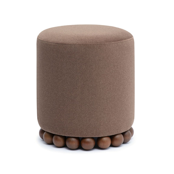 Round upholstered ottoman in taupe brown with beaded wooden base