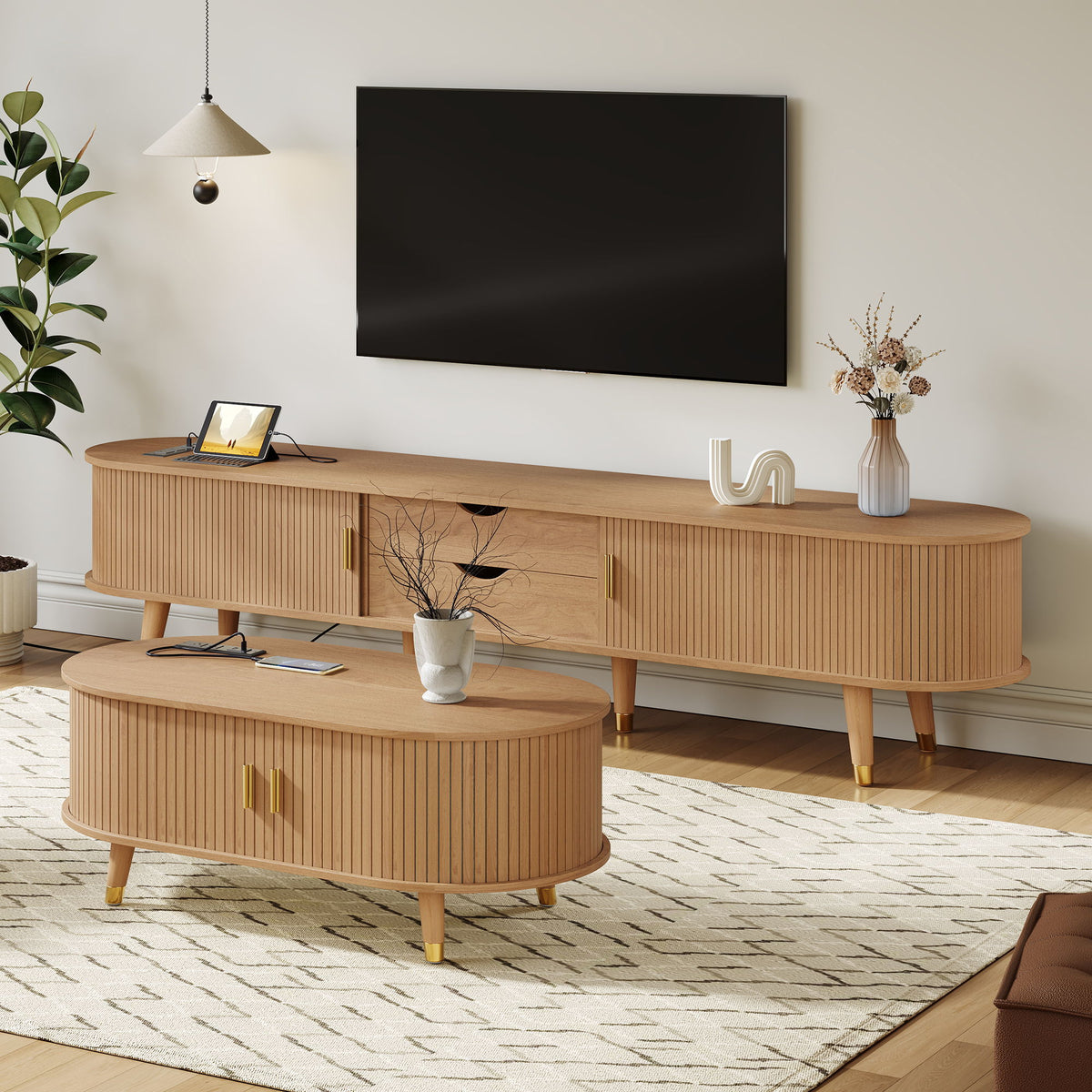 Light wood TV stand with curved side panels and round coffee table with side storage