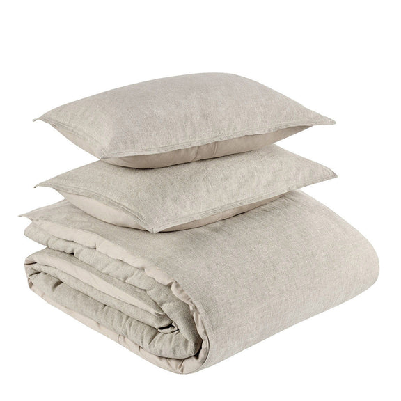 Gray folded duvet and pillow shams stack