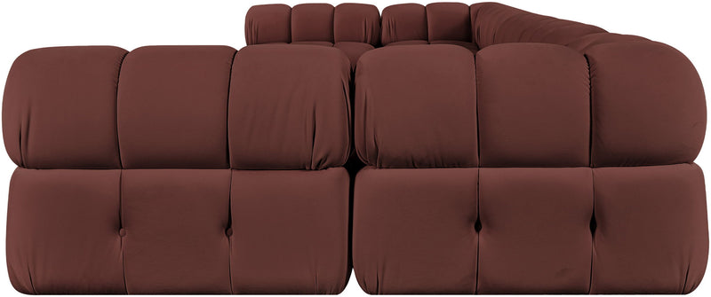 Dark red U-shaped modular sectional sofa with tufted cushions and rounded armrests
