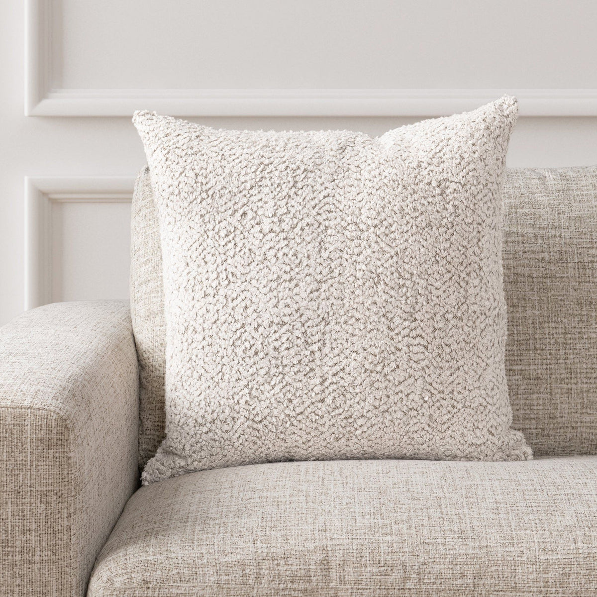 Ivory textured throw pillow