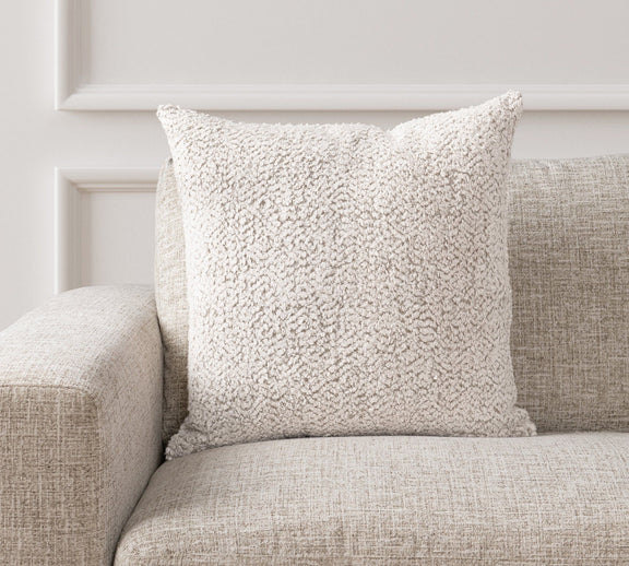 Ivory textured throw pillow