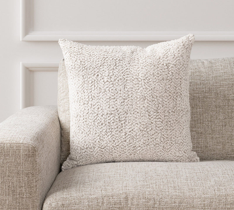 Ivory textured throw pillow