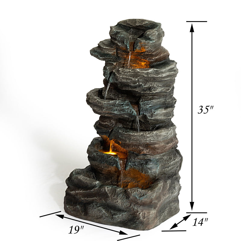 Gray tiered stone fountain, 35 in tall, 19 in wide, 14 in deep