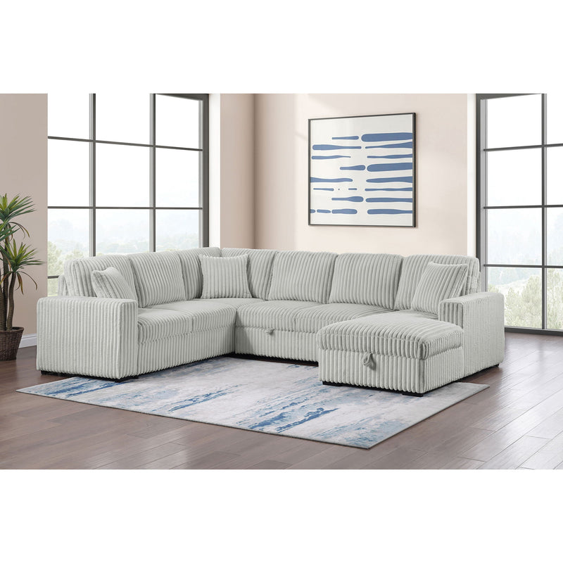 Light gray sectional sofa with chaise and striped upholstery, tufted seat cushions