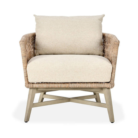 Outdoor accent chair with tall woven sides, sand upholstered seat, and back cushion