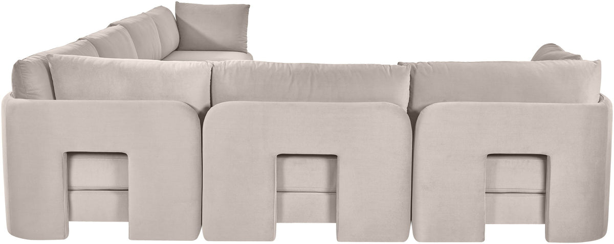 Light gray velvet corner sectional sofa with three front sections and low back pillows