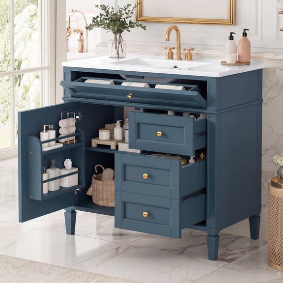 Blue vanity opened to show tip-out drawer, cabinet shelves and three pull-out drawers